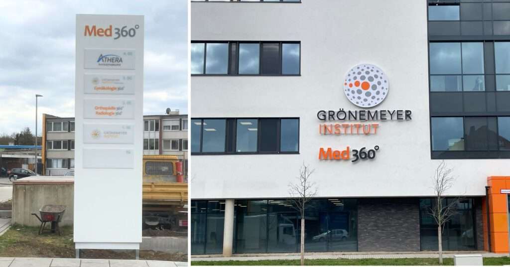 Leuchtschrift und beleuchtete Logos an der Außenfassade des Grönemeyer Instituts Bochum